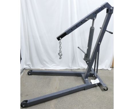 Switzer 1 tonne folding engine crane.