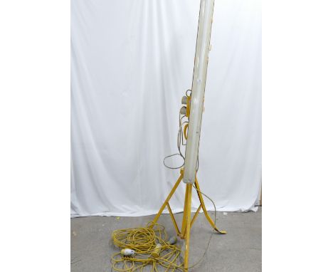 Portable 5 foot work lamp on tripod with 2 16 amp sockets and extension cable.