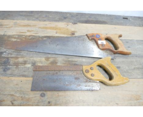 Two vintage Spear and Jackson hand saws.