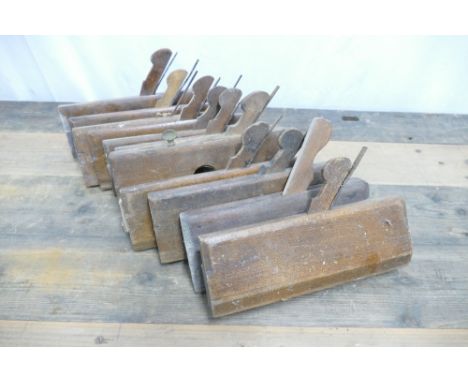 Box of eleven vintage moulding planes.