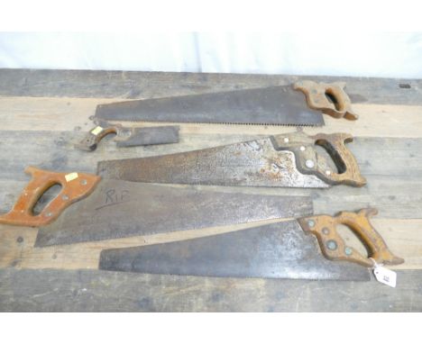 Collection of 5 vintage handsaws which include a Spear and Jackson, Disston and small dovetail saw.