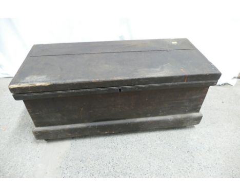 Wooden toolbox on casters measuring 38cm high, 87cm wide, 37cm deep, containing a collection of tools.