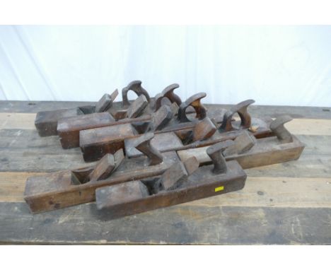 Collection of seven vintage carpenters box planes, largest measures approx. 56cm long, 9cm wide, 8cm deep.