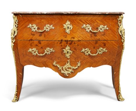 A French kingwood bombe commode, in the Louis XV style, last quarter 19th century, ormolu mounted and marquetry inlaid, the m