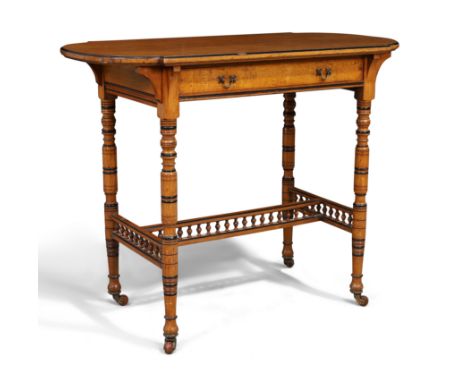 A Victorian Aesthetic movement oak side table by Marsh, Jones and Cribb, third quarter 19th century, part-ebonised, with sing