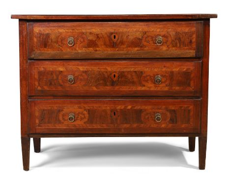 A inlaid walnut commode, 18th century, possibly Maltese, the crossbanded rectangular top above three drawers, on square taper