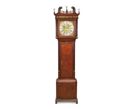 A George III oak longcase clock, last quarter 18th century, the broken swan neck pediment with three brass eagle and ball fin