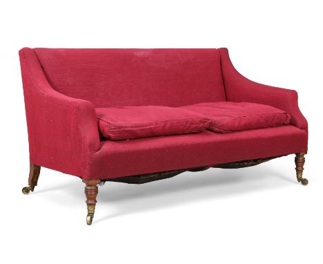 A Victorian mahogany framed two-seat sofa by Howard and Sons, last quarter 19th century, with burgundy upholstery, sloped arm