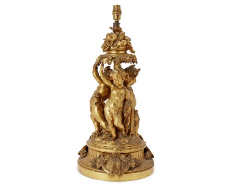 A French gilt-bronze figural table lamp, early 20th century, by PH Mourey, modelled as three Bacchic putto, on a circular bas