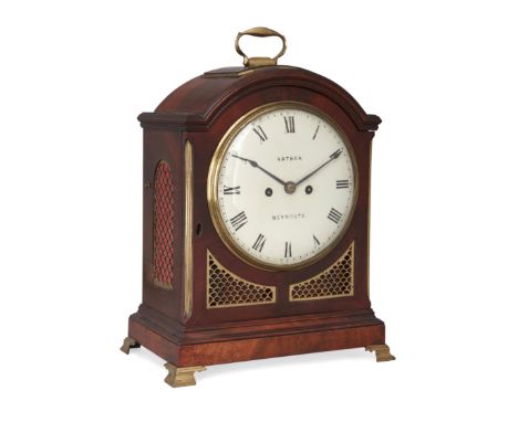 A Regency mahogany bracket clock, first quarter 19th century, the break-arch case with brass swing handle to brass fillet mou