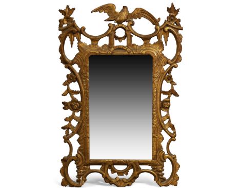 A George III giltwood mirror, last quarter 18th century, in the manner of Chippendale, rectangular plate set in moulded frame