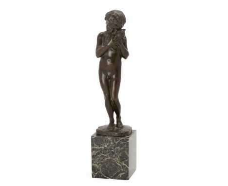 A bronze model of young boy cuddling a kitten, early 20th century, unsigned, on a variegated green marble square-section plin