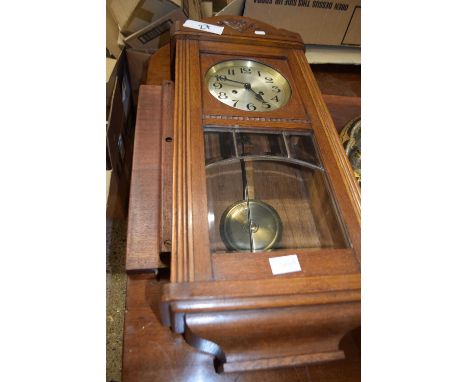 EARLY 20TH CENTURY OAK CASED WALL CLOCK