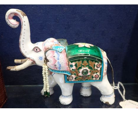 A ENAMEL STUDY OF AN ELEPHANT, 15cm long