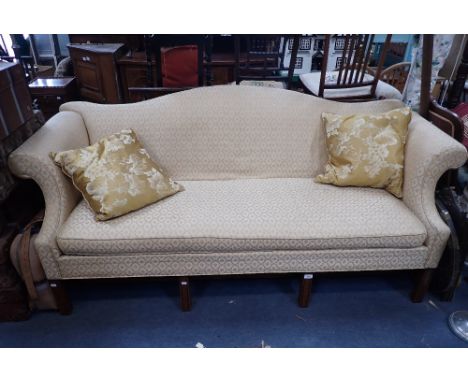 A GEORGE III STYLE MAHOGANY FRAMED CAMEL BACK SOFA, with squab cushion, 202cm wide