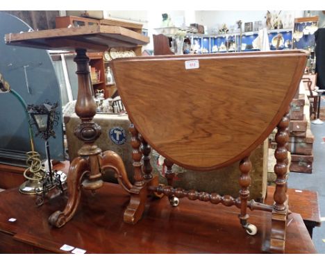 A VICTORIAN WALNUT SUTHERLAND TABLE with bobbin turned lags and a tripod table (2)