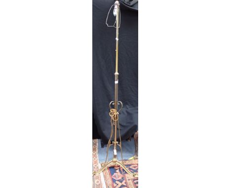 AN EDWARDIAN ART NOUVEAU STYLE BRASS STANDARD LAMP