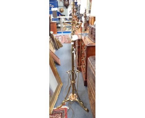 A VICTORIAN BRASS STANDARD LAMP (converted for electricity)