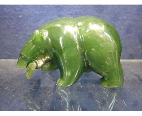 A GREEN 'JADE' STUDY OF A BEAR, 8cm long