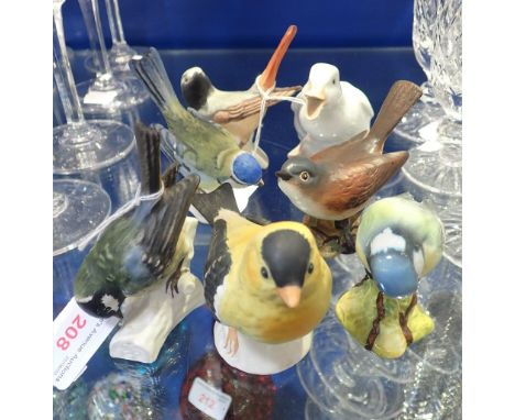 A COLLECTION OF CERAMIC BIRDS, by Gobel, Beswick and Nao (7)