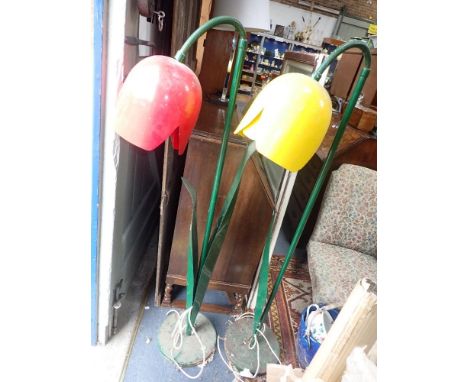 A PAIR OF PETER BLISS POP ART TULIP STANDARD LAMPS, one red, one yellow (examine, both rusted, yellow one missing a leaf)
