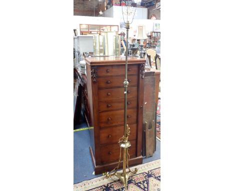 AN EDWARDIAN BRASS STANDARD LAMP 