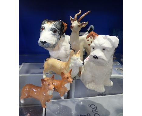 A BESWICK DOG, 16cm high, two Corgis and similar ceramic figures