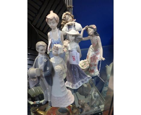 LLADRO; A COLLECTION OF FIGURES to include a bride and groom (5) (all boxed)