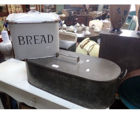 A TINPLATE FISH KETTLE, 63cms long and an enamel breadbin