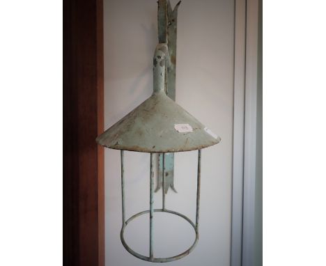 A WROUGHT METAL OUTDOOR LAMP BRACKET
