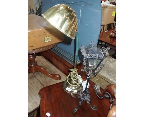 A BRASS STUDENT'S LAMP WITH SHELL SHADE and a kitsch wrought iron lamp
