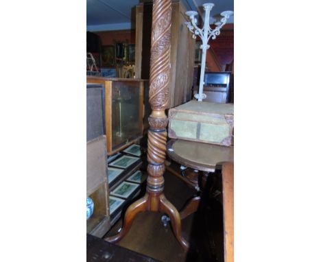 A Carved Mahogany Standard Lamp, no shade.
