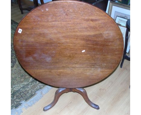 A Georgian Mahogany Tilt Top Circular Table on tripod base, the top 34.5ins in diameter.