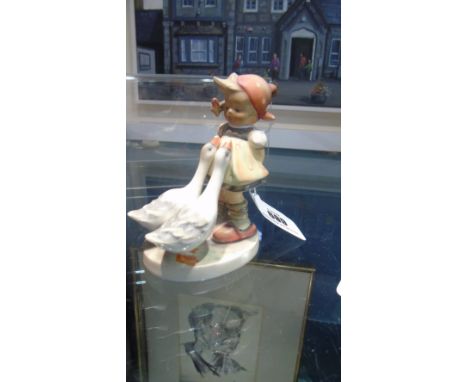 A Goebel Figure Of A Girl With Two Geese.