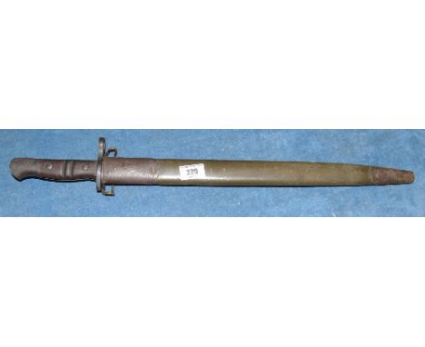 A US 1917 Eddystone Bayonet with original steel and leather scabbard. Stamped with the 1917 over the Remington (circle) manuf