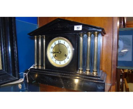 A Victorian Black Slate Mantel Clock with Key & Pendulum (working acc. to owner).