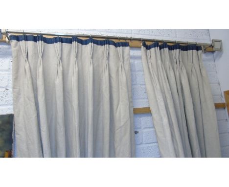 Two Pairs of Heavy, Lined Neutral Curtains with Blue Top Trim, with silver coloured curtain poles and rings, together with Tw