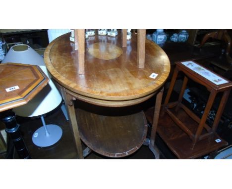 A Late 19th Century Mahogany and Inlaid Centre Table; with inlaid central fan decoration.