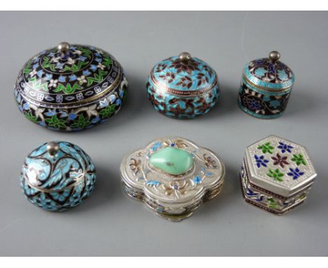 A STAMPED SILVER PILL BOX & FIVE OTHERS in unmarked white metal, all six enamel decorated, one with mounted cabochon green st