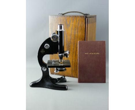 A POLISHED ENCASED BECK MICROSCOPE, model 29, circa 1940s, owned by a medical person and very little used, in near mint condi