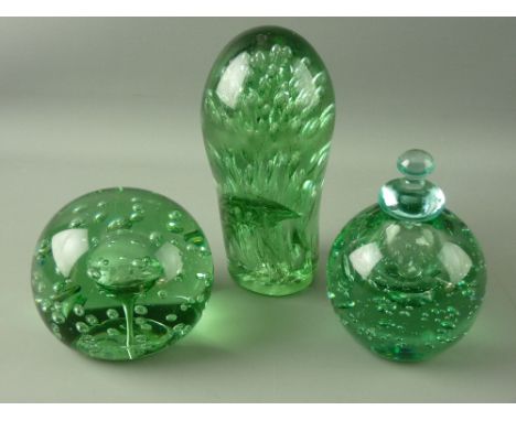 THREE VICTORIAN GREEN GLASS DUMP PAPERWEIGHTS all with bubble inclusions, one inkwell type with stopper, 19 cms high the larg