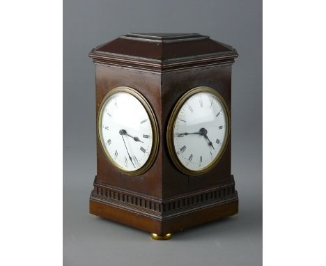 A RARE & UNUSUAL MAHOGANY CASED TWIN FACE MANTEL CLOCK, the angular case with twin enamel dials set with Roman numerals and o