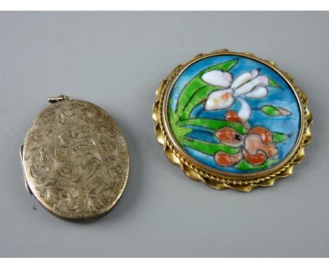 A BRIGHT CUT OVAL LOCKET and a circular Limoges brooch, the locket stamped twenty two carat on silver back and front, the bro