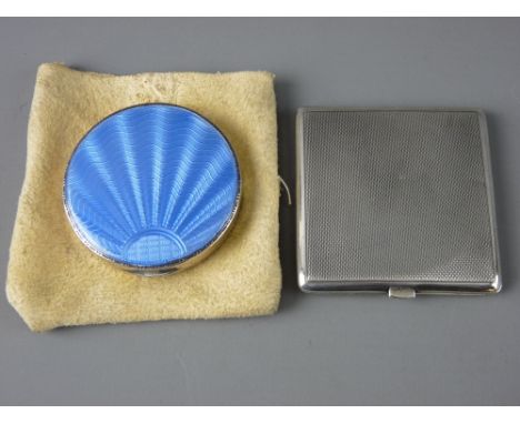 A LADY'S PART SILVER ENGINE TURNED POWDER COMPACT, Birmingham 1936 and a lady's circular part silver and blue enamel compact,