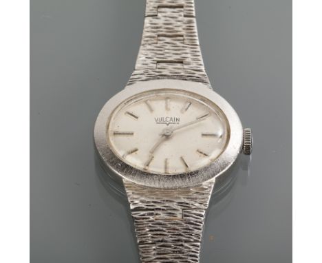 LADY'S VULCAIN MANUAL WRIST WATCH the oval dial with baton numerals, the case approximately 22mm across, on a textured bracel