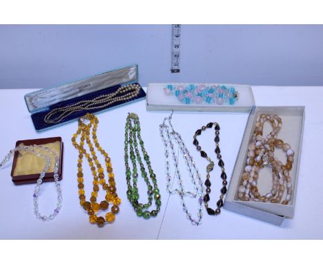 A selection of assorted vintage glass jewellery 