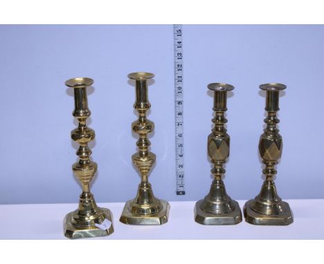 Two pairs of vintage brass candlesticks 