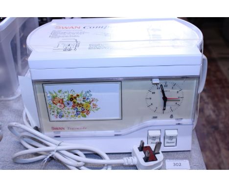 A vintage Swan teasmade as new (untested). Shipping unavailable 
