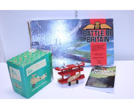 A boxed vintage Battle of Britain board game and two other military related items 