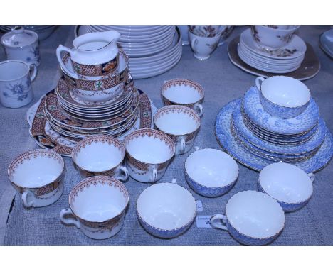 A vintage Rosina tea service and a Niall blue and white part tea service, shipping unavailable 